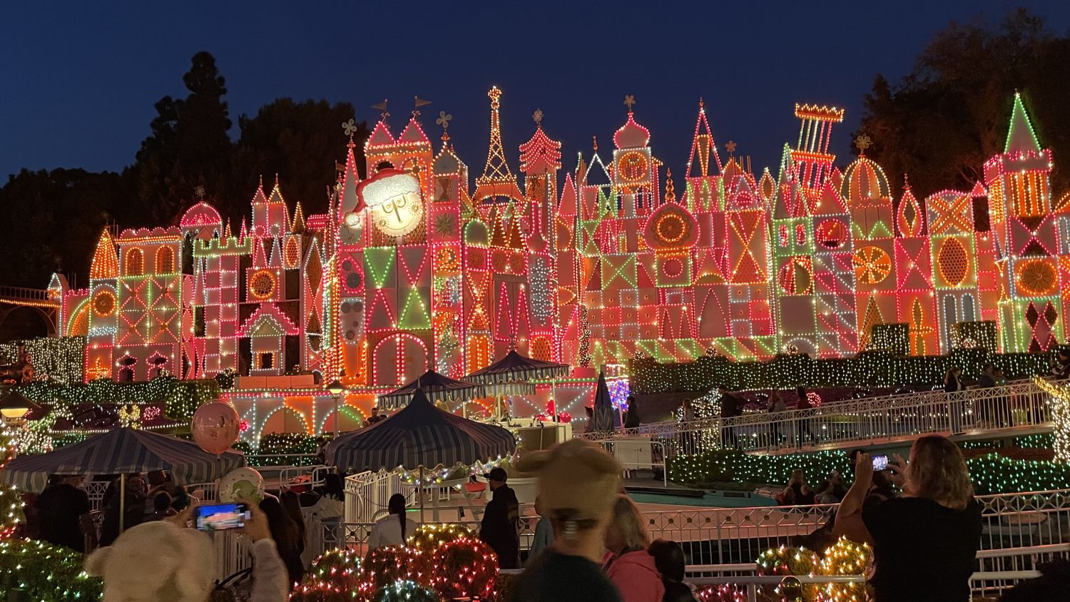 Disney castle illuminated at night